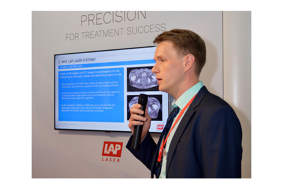 Dr. Steffen Lissner presenting new laser systems at ESTRO